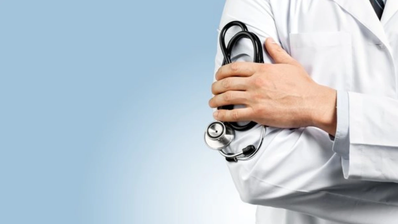Physician in a white coat holding a stethoscope, representing psychiatry telehealth claim billing requirements